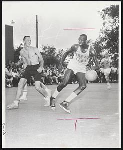 Celtics Star Tommy Sanders heads for basket while playing for Burke Club in the Quincy YMCA Senior summer basketball league. He and Celtics teammates Tommy Heinsohn and K.C. Jones scored 60 points as the club defeated the Milton Wildmen 83 to 37. They will play again Monday against the Quincy Turtles.