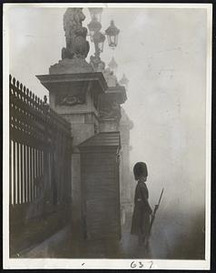 Fog Spares not Even Buckingham Palace. When the first severe fog of the year hit London on Oct. 18, street traffic was slowed down to a walk, many air and sea traffic services had to be cancelled and road clashes took a heavy toll. even historic Buckingham Palace was not spared from the darkness. A guardsman is shown outside the palace on sentry duty the morning in Oct. 18.