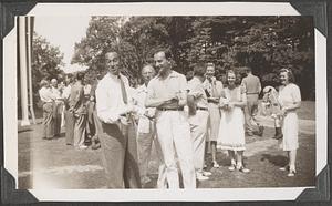 An unidentified group of people on the lawn by the Koussevitzky Music Shed