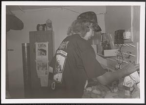 Young man in art class making tie-dye shirts