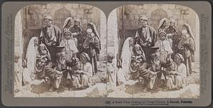 A Greek priest blessing the village children in Ramah, Palestine