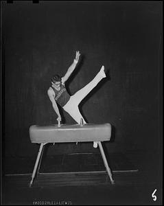 SC gymnast doing leg swings on the pommel horse