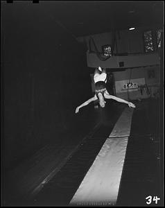 SC gymnast doing a flip in a tumbling run