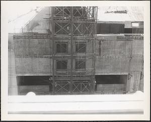 Construction of Boylston Building, Boston Public Library, close up of scaffolding at roofline