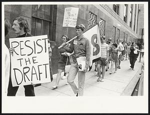 Draft resisters coming down Water St. towards Federal BLDG. to bring David Stoppelman the resister to the marshal