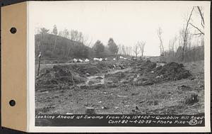 Contract No. 82, Constructing Quabbin Hill Road, Ware, looking ahead at swamp from Sta. 154+00, Ware, Mass., Apr. 20, 1939