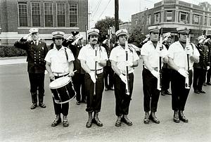 Left to right, firefighter McDonald, Lt. Von Handorf, firefighters McGinnis, Abramofsky, Dod, Grafton, Nowicki, Buckley, and Denning