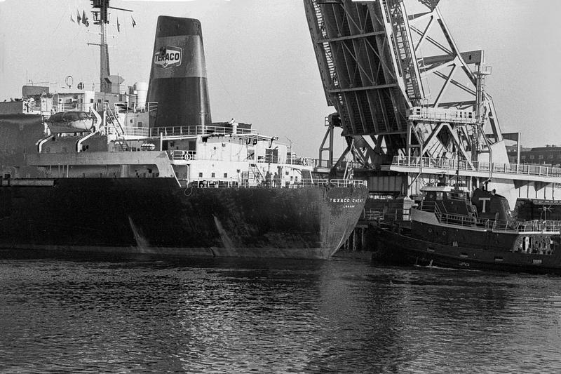 Texaco tanker going under the bridge - Digital Commonwealth