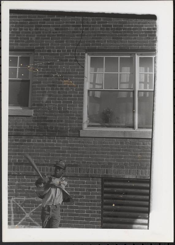 Dana up to bat during a baseball in Newtowne Court