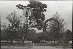 Curtis doing bike tricks