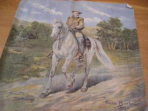 Man on horseback in landscape