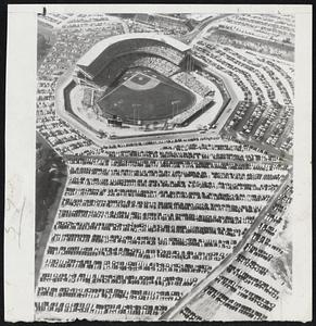 Full House-The 100-acre parking lot pessimists said a year ago might never be filled looked like this Sunday as 36,119 fans paid their way into Milwaukee County stadium for a Braves-Cubs doubleheader.