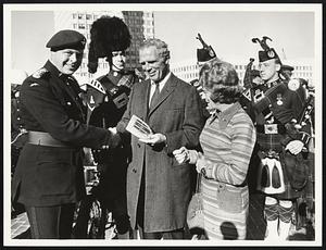 Presentation - Made Mayor Hon. member of Parashute regiment left commander of Tatoo Colonel W.R. Corvould commanding Parachute regim. Mayor Kevin H. White pres. W.R. Corvould in back British pipers