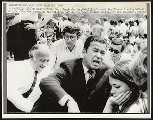 Sen. Jacob Javits, R-N.Y. (left) and Sen. Edward Brooke, R-Mass., mingle with the crowd on the Ellipse 5/9 during huge antiwar rally.