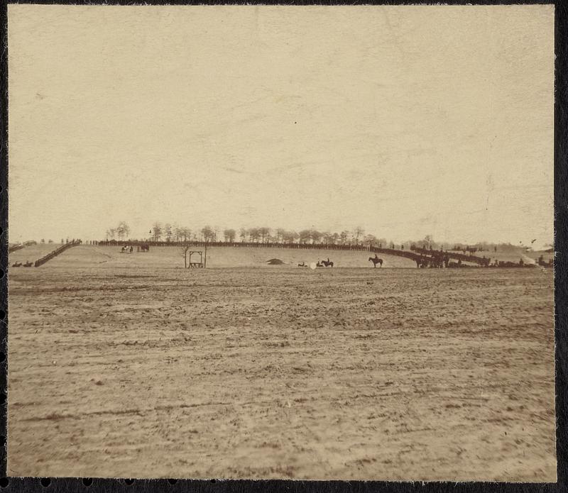 Troops drawn up in hollow square to witness an execution