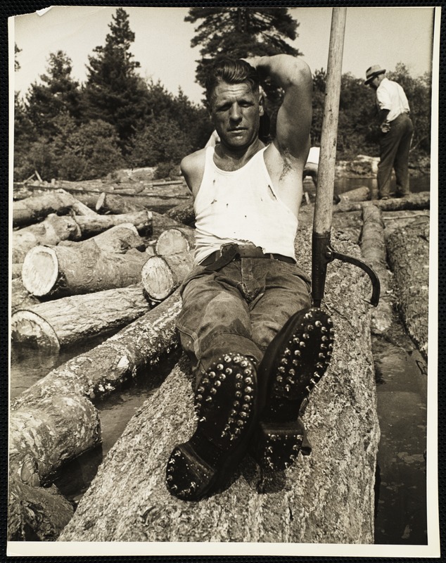 Saco River, man Edward Burrill of Limington, Me. wearing his spiked shoes. 1939