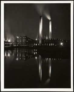 Great Northern Paper Company newsprint plant at night - Millinocket, Maine - this reflection is in the Penobscot River.