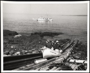 Matinicus Rock, Maine. Visitors (bird lovers) being hauled up the ramp by the Coast Guard
