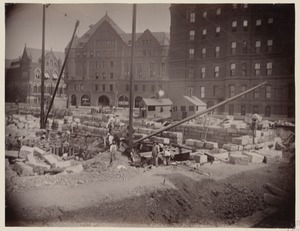 Laying granite blocks for foundation, construction of the McKim Building