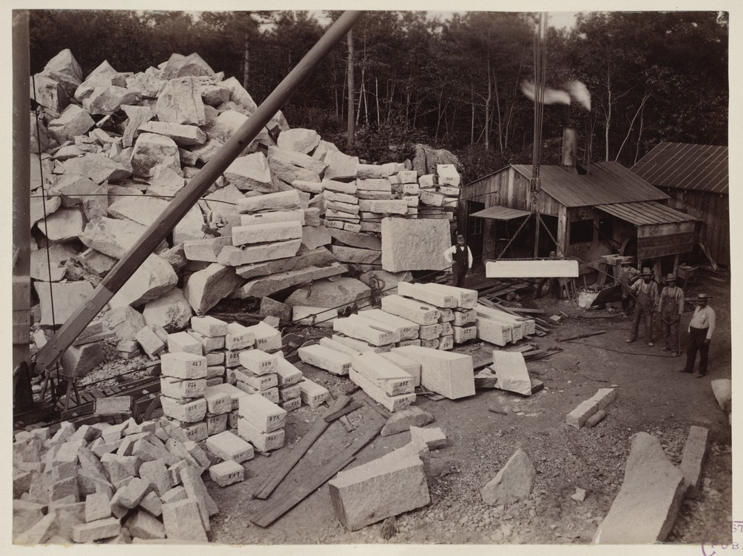 Granite blocks at the Milford Quarry, numbered for transport to the McKim Building construction site