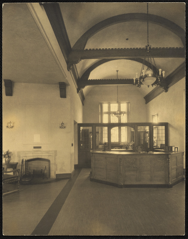 Interior of the Waban Branch Library showing circulation desk and