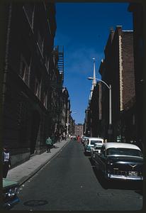 Partial view of Old North Church steeple at end of street