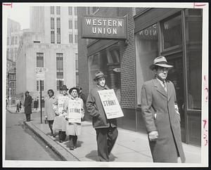 Western Union Employes Strike-Pickets appeared on High Congress streets today, patrolling the 11-story Western Union building as 4000 workers quit in New England in a nation-wide telegraph strike.