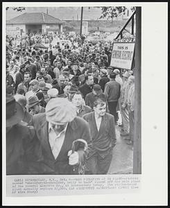 Schenectady, N.Y. -- Mass Picketing At GE Plant -- Pickets massed "shoulder-to-shoulder, belly to back" closed off the main plant of the General Electric Co., at Schenectady today. The strike-bound plant normally employs 22,000.