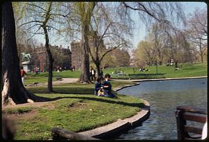 People sitting by lagoon, Boston Public Garden