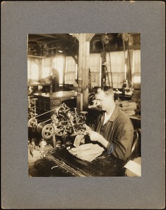 Man using stitching machine