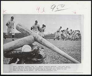 Spring Training Routine - The bats; balls and gloves must wait until the limbering up exercise are completed. Here the early arrivals at the Detroit Tigers camp go through their paces as they start the long spring grind.