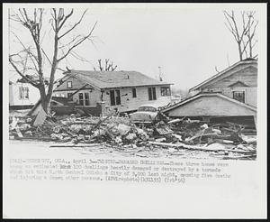 Twister-Damaged Dwellings--These three homes were among an estimated 100 dwellings heavily damaged or destroyed by a tornado which hit this North Central Oklahoma City of 5,000 last night, causing five deaths and injuring a dozen other persons.