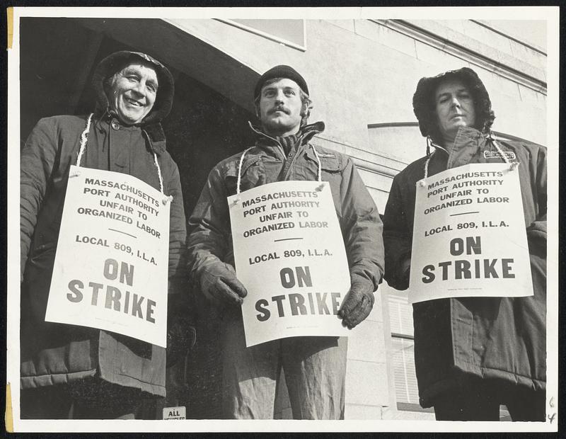 Striking dock workers on Commonwealth Pier. From left, Charles Oates, Stan Lukas and James Ahern.