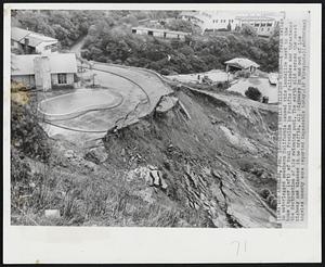 Slide Perils Hillside Homes--A fresh deluge in waterlogged southern California caused this landslide next to the home (upper left) of Paul Franklin in Pacific Palisades and threatened the destruction of his swimming pool. The earth slid across the coast highway and blocked it to traffic. All highways in and out of Los Angeles county were reported impassable today.