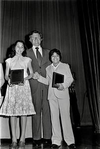 Lucas Rodriquez and unidentified girl receive science awards from Senator Ted Kennedy