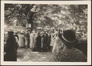 Crowd near games area, street fair