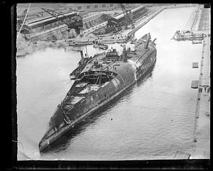 In dock upside down, the German cruiser Moltke at Rosyth, Scotland, ready to be cut up