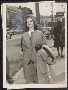 Mrs. Miriam C. Simms leaving the Roxbury court