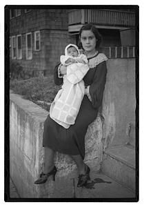 Mercedes Pasarell Sanromá holding a baby