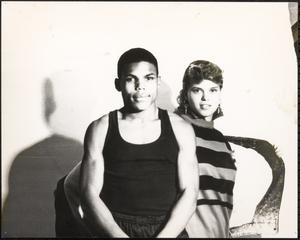 Two young people posing together