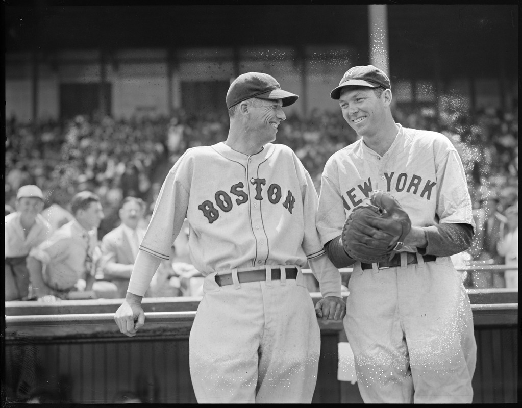 Lefty Grove talking to Yankees player at Fenway