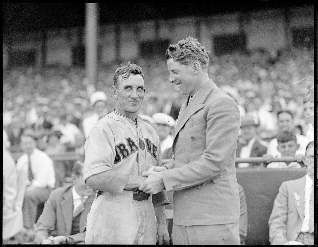 Singer Rudy Vallee visits with Rabbit Maranville at Braves Field