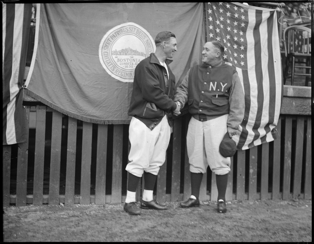 Red Sox manager Marty McManus shaking hands with Yankee Manager Joe McCarthy