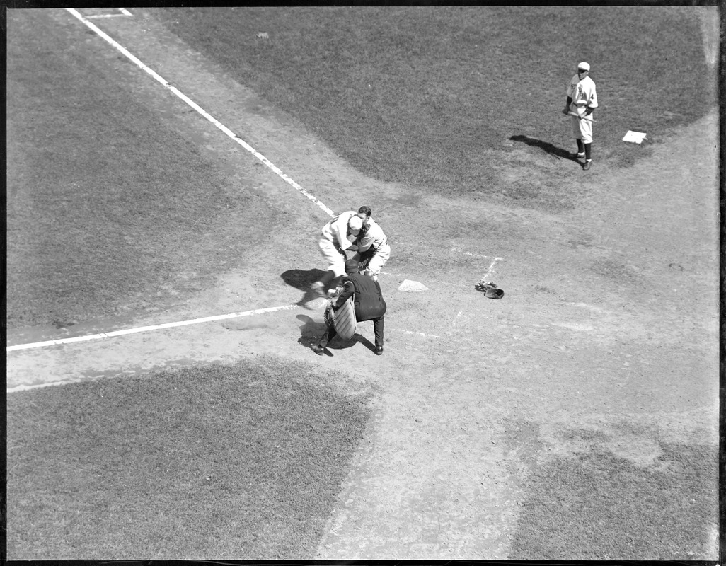Ray Johnson, Red Sox, collides with Bill Dickey, Yankees. Dickey was knocked unconscious and dropped the ball, Johnson was safe. Throw was from Babe Ruth.