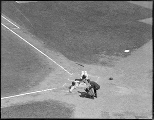Lyn Lary of the Yankees tagged out by Benny Tate of the Red Sox on throw from first baseman Dale Alexander