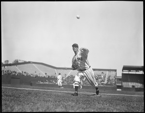 Lefty Grove in real action at Fenway. He is baseball's highest paid pitcher.