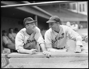 Two Detroit Tigers share a laugh in Fenway dugout