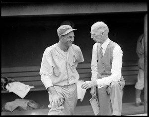Connie Mack talks with Athletics player in Fenway dugout