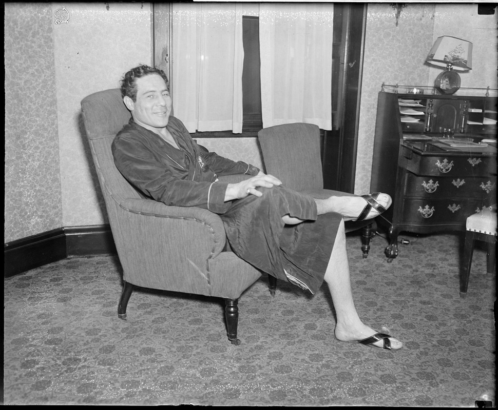 Max Baer relaxing in room at Hotel Touraine