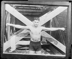 Boxing great Jack Dempsey shows his reach